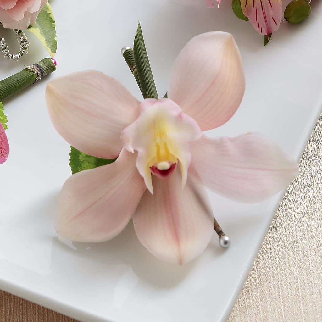 Pink Cymbidium Boutonniere – GOOSEBERRIES FLOWER SHOP BY BERKOT'S, Twin Lakes WI