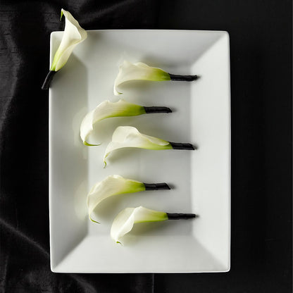 Calla Lily Promise Boutonniere – GOOSEBERRIES FLOWER SHOP BY BERKOT'S, Twin Lakes WI
