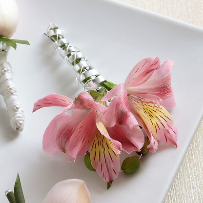 Pink Peruvian Lily Boutonniere – GOOSEBERRIES FLOWER SHOP BY BERKOT'S, Twin Lakes WI