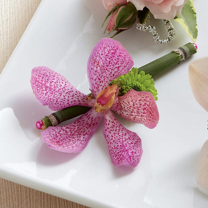 Pink Mokara Boutonniere – GOOSEBERRIES FLOWER SHOP BY BERKOT'S, Twin Lakes WI